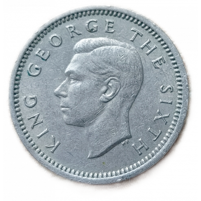 Новая Зеландия 3 Пенса 1952 год Перекрещенные пату Георг 6